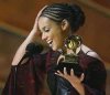 alica keys with cornrows in bun.jpg