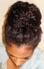 messy braided relaxed hair bun.jpg